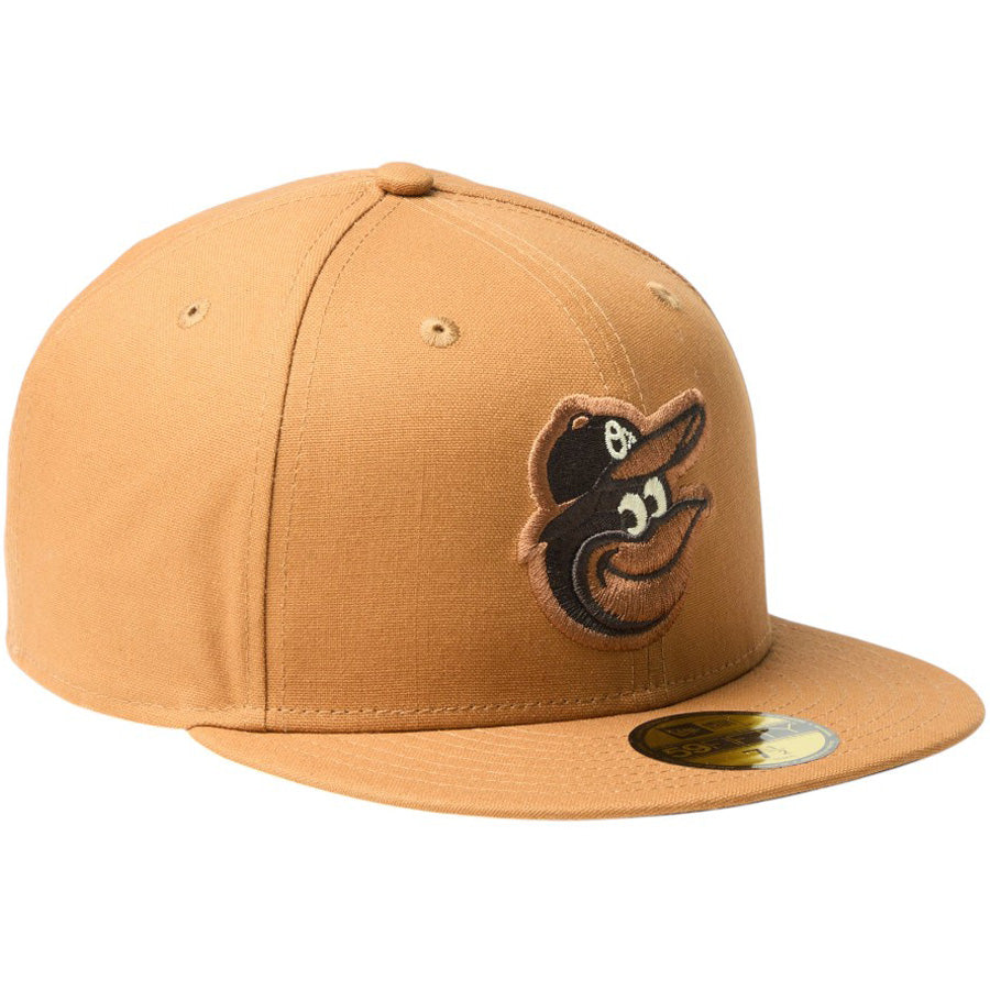 ニューエラ キャップ 帽子 NEW ERA CAP 59FIFTY MLB Duck Canvas ダック キャンバス ボルティモア オリオールズ ライトブロンズ 14745191 左斜め前