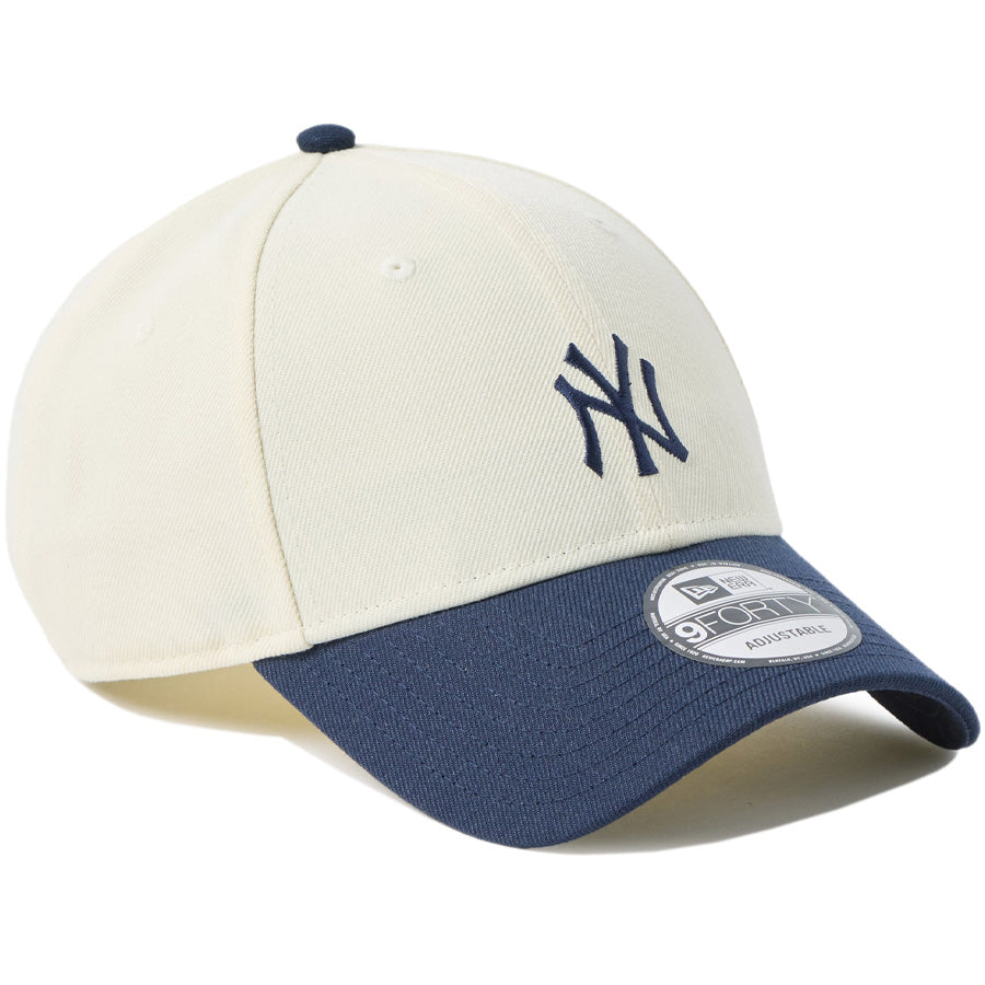 ニューエラ キャップ 帽子 NEW ERA CAP 9FORTY MLB ベージュ スウェットバンド ニューヨーク ヤンキース クロームホワイト/ナイトシフトネイビー 14744846 左斜め前