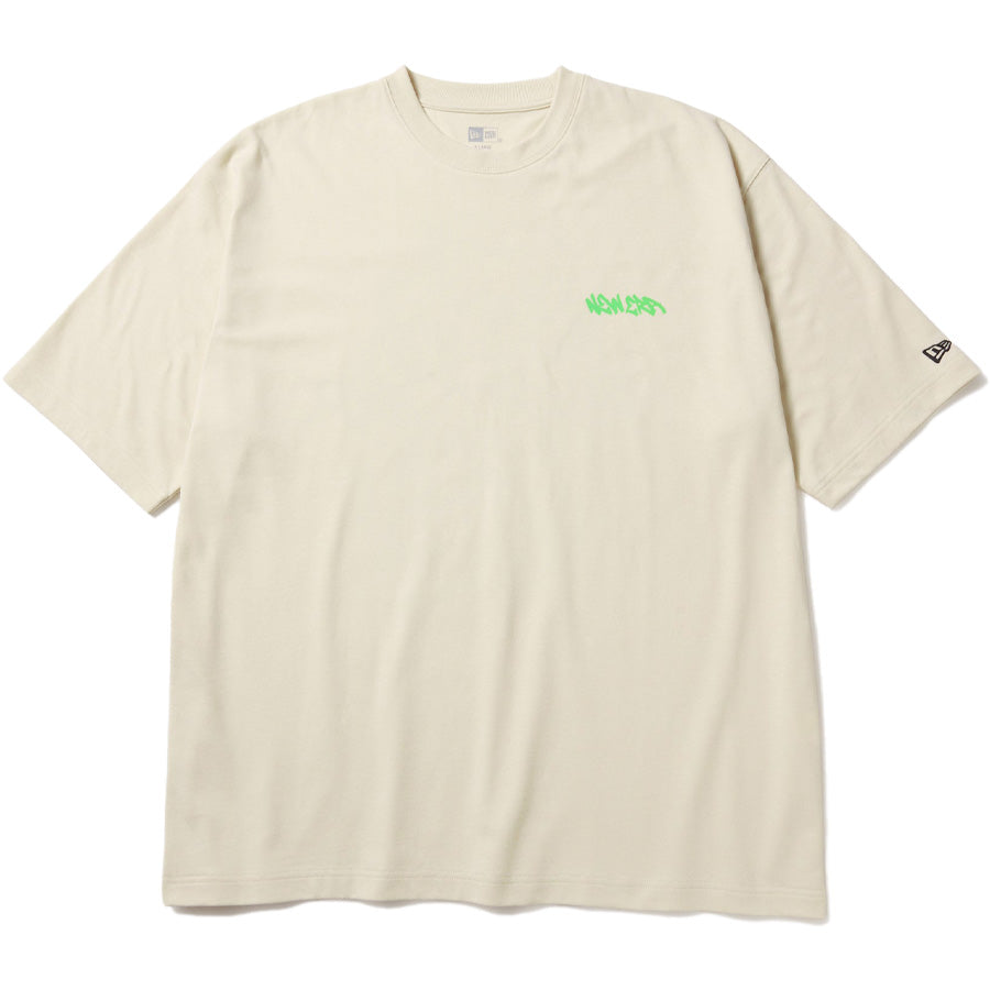 ニューエラ アパレル NEW ERA 半袖 オーバーサイズド コットン Tシャツ Tagging タギング グラフィティ クリーム 14856666 フロント
